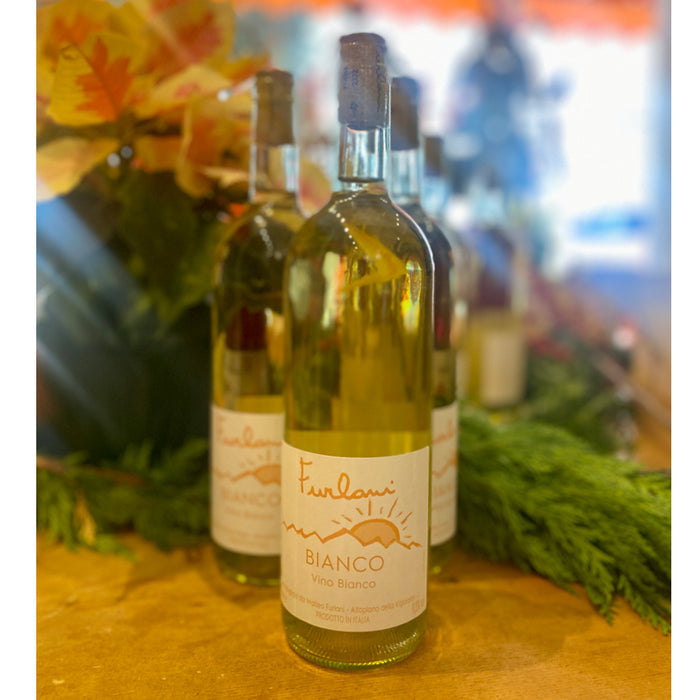 Furlani Bianco wine bottles, front bottle with beige label and cork