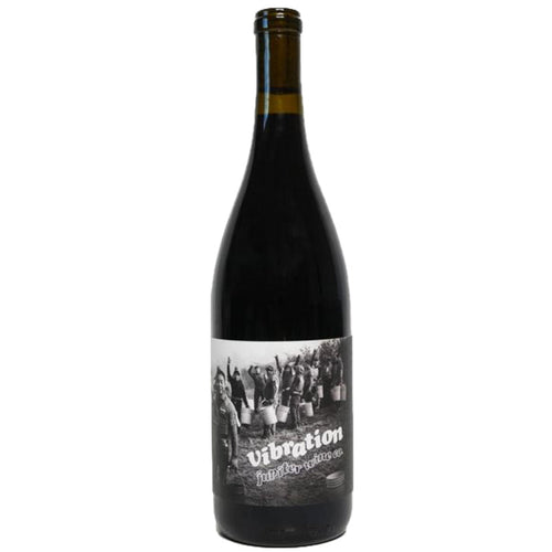 Dark wine bottle with cream label and crowd photo graphic